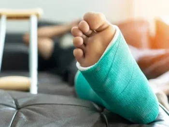 Podiatric surgeon performing foot and ankle surgery