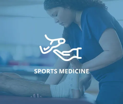 A sports medicine professional wrapping an athlete's ankle with a focus on treatment and recovery.