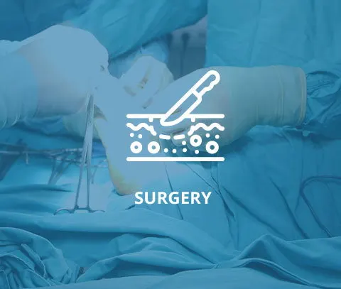 Medical team performing surgical procedure in a sterile environment.